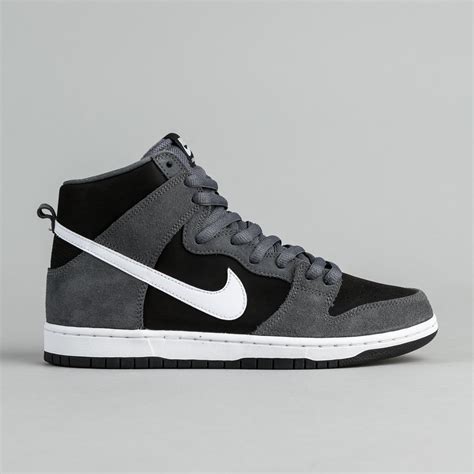 black grey white nike shoes.